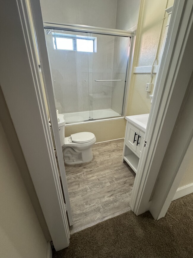 Newly renovated en suite bathroom. - 1749 E 3rd St