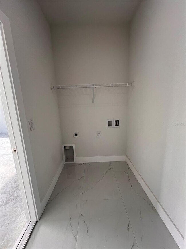 Building Photo - Be the first in occupy this 2025 constructed home in the vibrant city of Port Charlotte, FL! Qual...