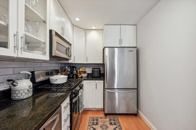 Building Photo - 312-320-320 W 3rd St