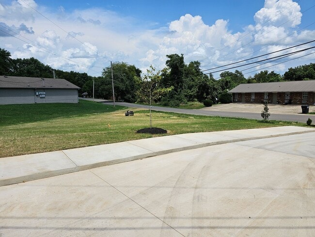 Building Photo - Built in 2024! Close to downtown 2 Bed/2.5 Bath. Nice private backyard with trees