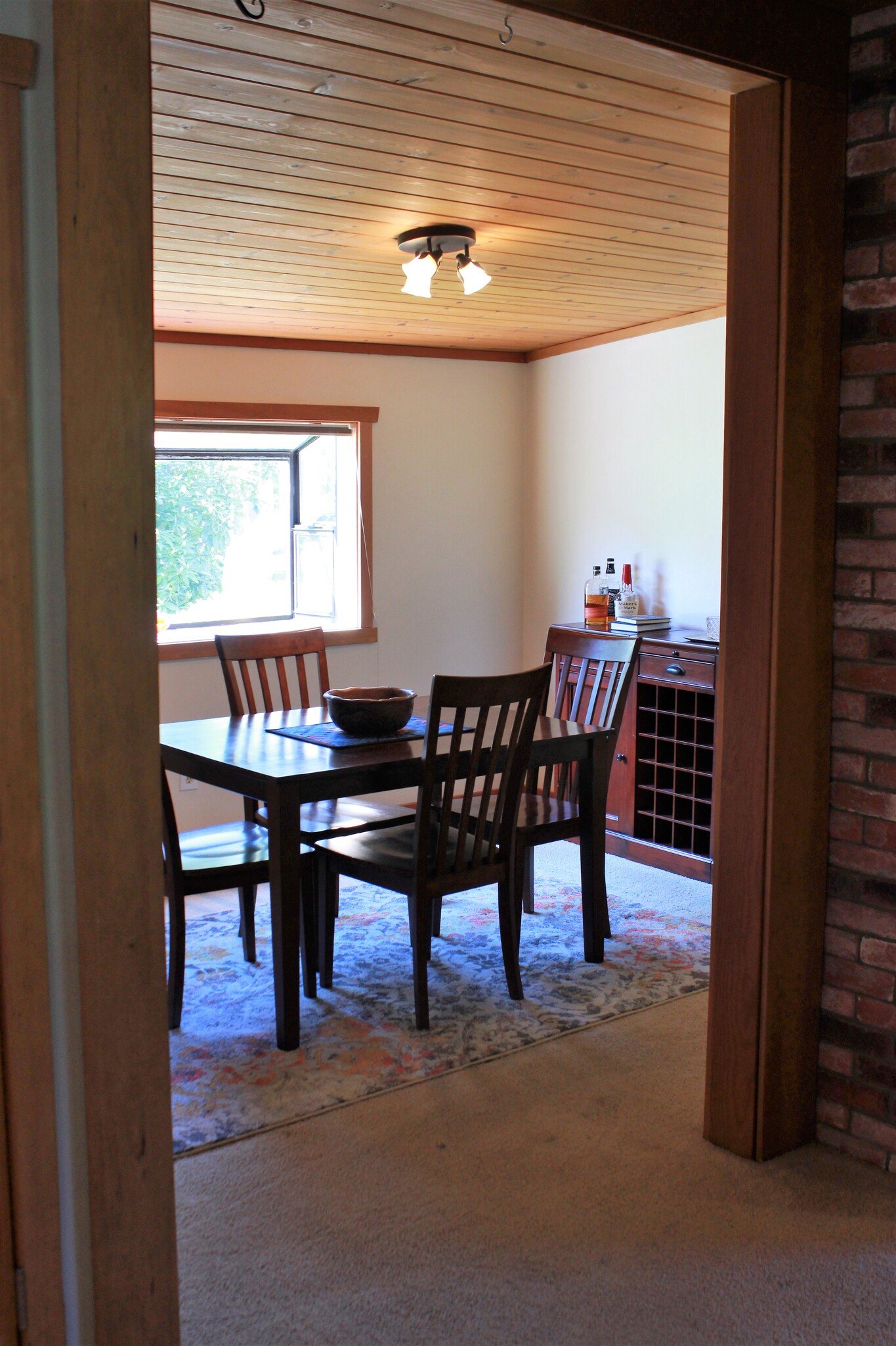 Dining room has bay window that looks out on garden - 1236 Northeast 103rd Street