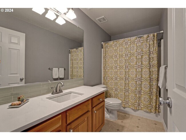 Building Photo - 11868 NW Permian Ct