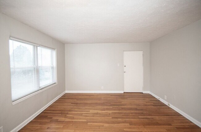 Building Photo - "Charming 2-Bedroom Retreat with Hardwood Elegance in Indianapolis"
