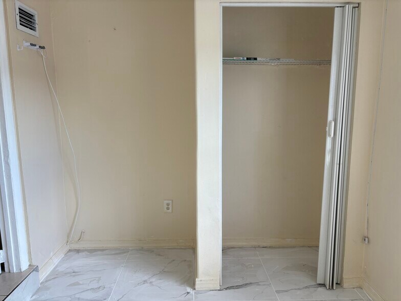Closet and to the left is where the dresser was - 209 NW 28th Ave