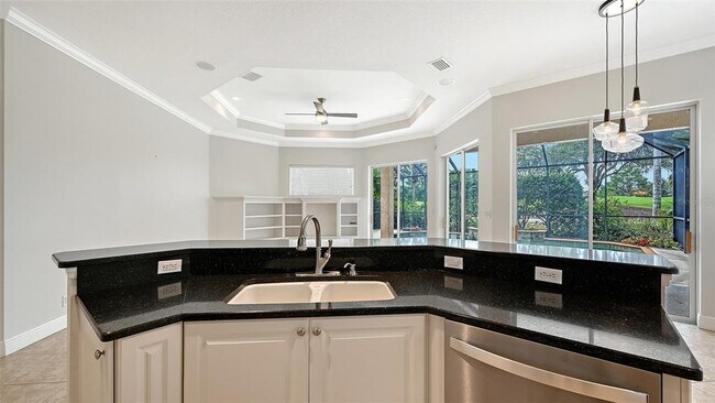 Building Photo - 7244 Orchid Island Pl