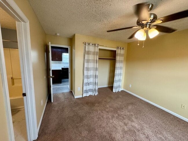 Building Photo - LARGE FENCED YARD, and lawn care INCLUDED