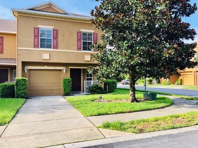 Building Photo - OVIEDO/UCF RENTAL! Wonderful 3 bd 2.5 bath corner unit townhome! 1 CAR ATTACHED GARAGE!NO CARPET!...