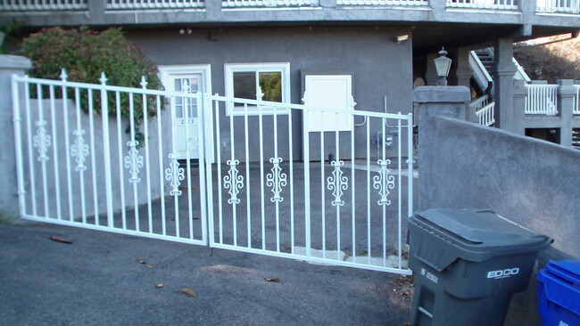 Private entrances and gated parking for two cars. - 2373 Mountain View Dr