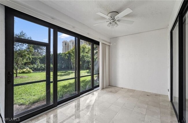 Building Photo - 7056 Pelican Bay Blvd
