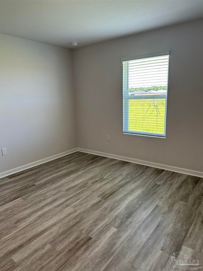 Building Photo - 6497 Firefly Dr