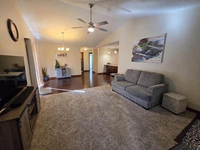 Building Photo - FREE SEPTEMBER RENT for this Spacious 4-Bedroom Home with Vaulted Ceilings with Finished Basement...