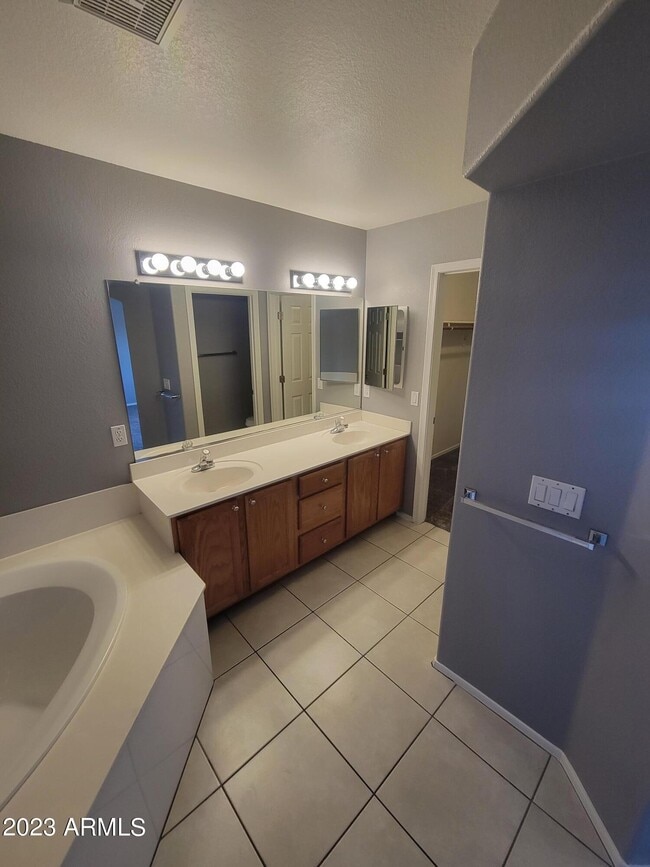 Building Photo - 5846 W Gelding Dr