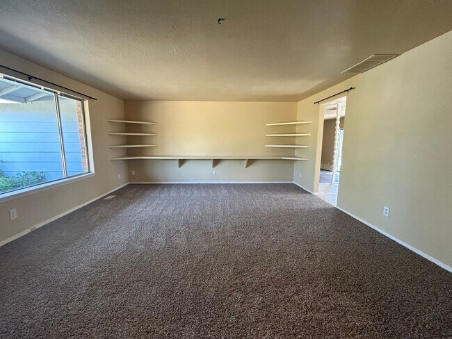 Building Photo - Corner Lot Home w/ Giant Yards, Covered Patio & Minutes to Boise Spectrum Center!