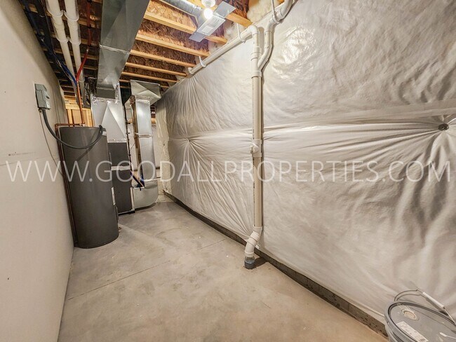 Building Photo - Spacious Waukee Ranch | 4 Bedrooms | 3-Car Garage | Finished Basement