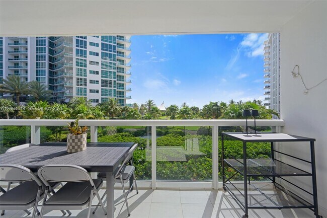 Building Photo - 10275 Collins Ave