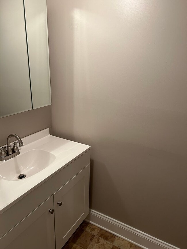 Building Photo - Modern Charm: 2 BR Home with Finished Basement, Pet Friendly, Assigned Parking, and Prime Location!