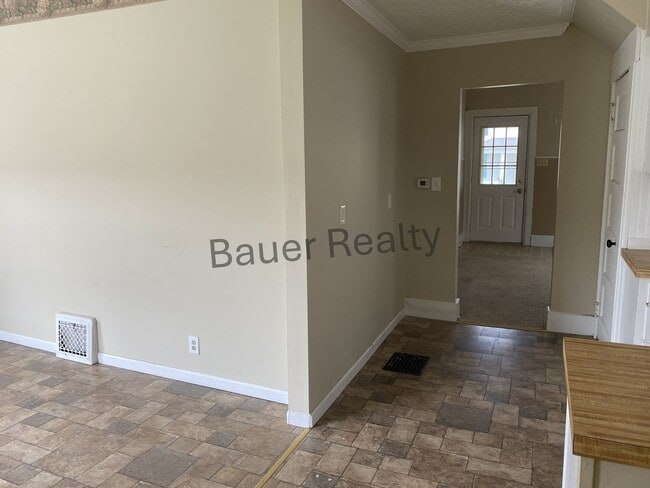 Building Photo - Three Bedrooms, One and a Half Baths