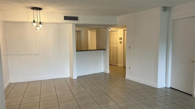 Building Photo - 4215 N University Dr