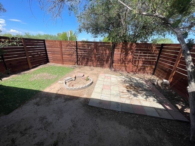 Building Photo - OPEN HOUSE! Remodeled Two Bedroom, End Unit with A/C and Large Fenced Yard