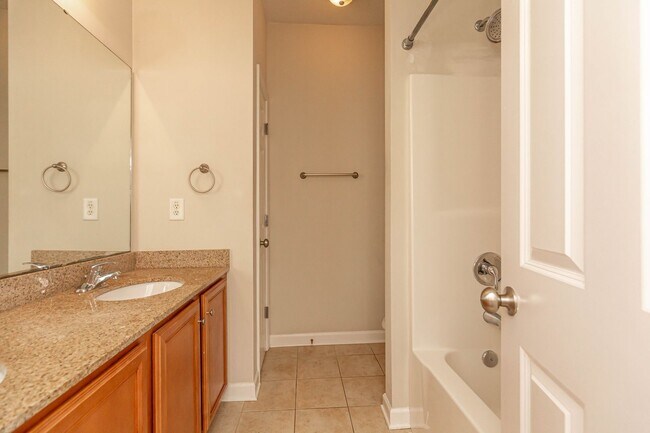 Building Photo - Located just Steps from Shopping, Dining, ...