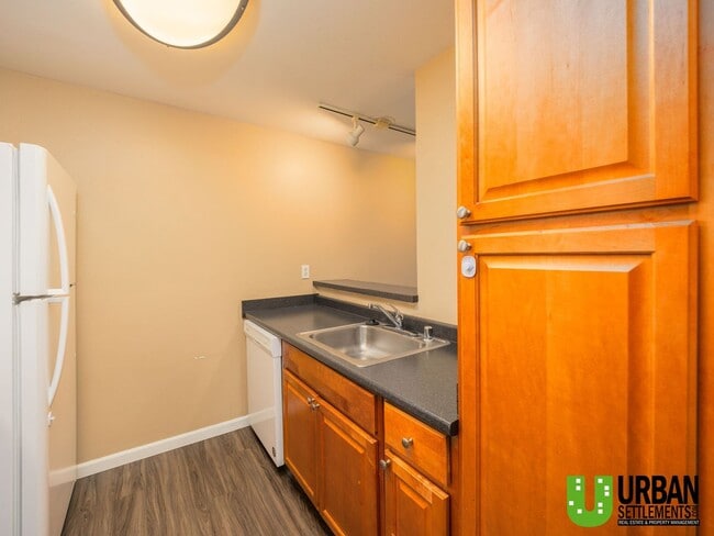 Building Photo - Comfortable 1-Bedroom Condo with Parking & Resort-Style Amenities