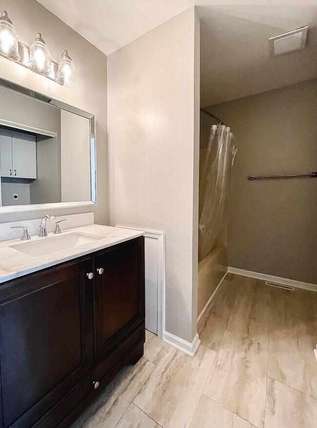 Hallway Bathroom & Laundry - 156 Versailles Ct