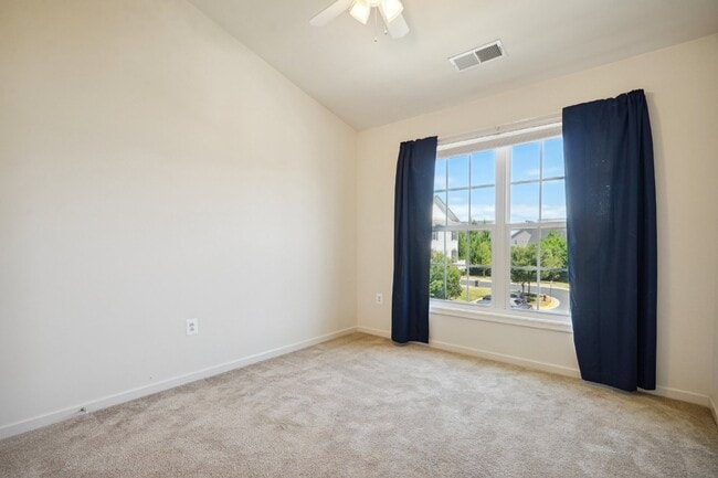 Building Photo - This beautiful townhome spans three finished levels and over 2800 square feet.