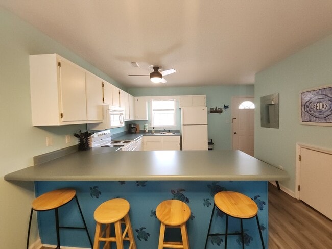 Building Photo - Welcome to our charming townhouse in Pelle...