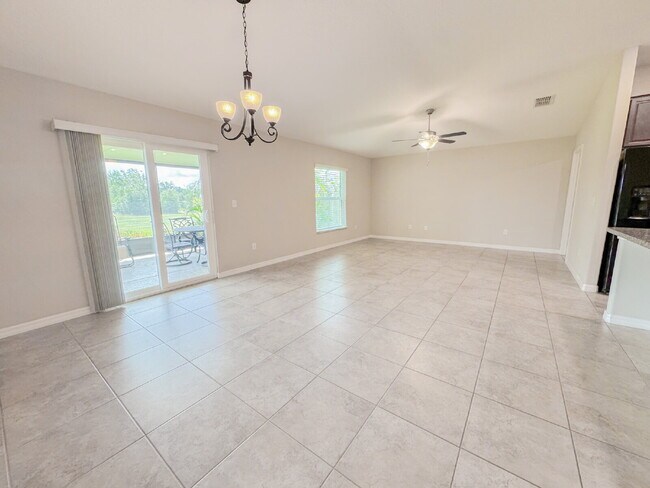 Building Photo - "Charming 3-Bedroom Home with Elegant Granite Touches in Wimauma!" Community pool! Fitness center...