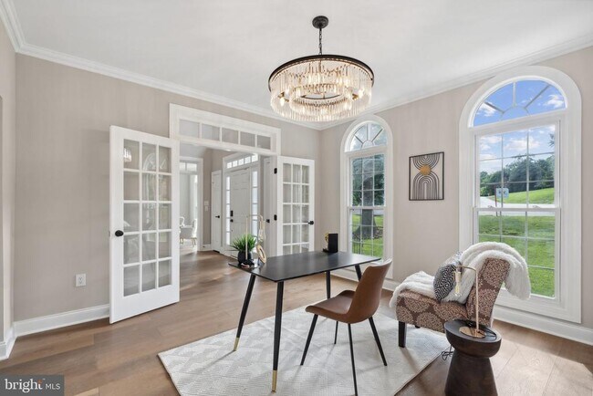 Building Photo - 10899 Woodland Falls Dr
