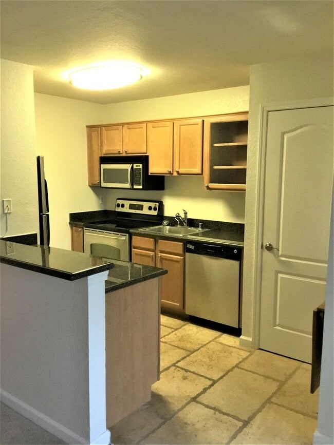 Building Photo - Studio at Baywood Villas