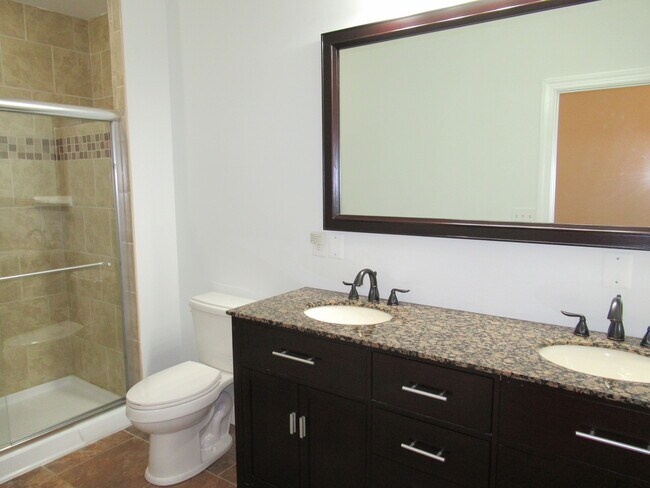 Building Photo - Charming 4 Bedroom/3.5 Bathroom Townhome with Parking Pad in Station North, MD!