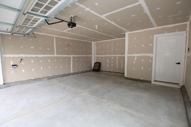 Building Photo - Maintenance Free Living in this Brand New ...