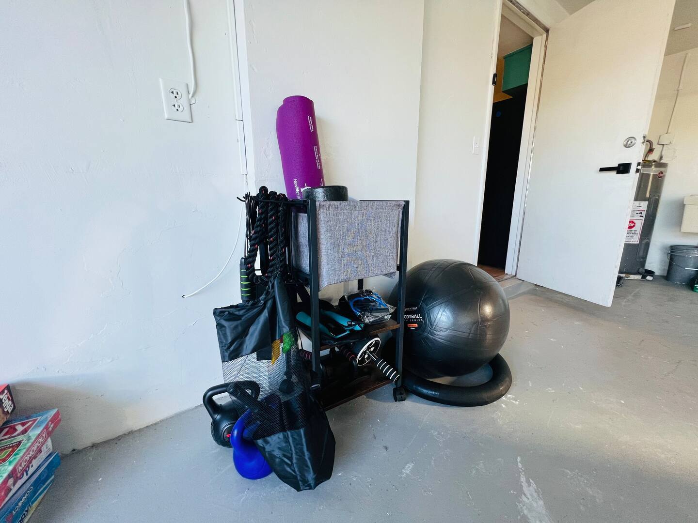 Garage is designated workout, game area, and laundry. - 5544 Baroque Dr