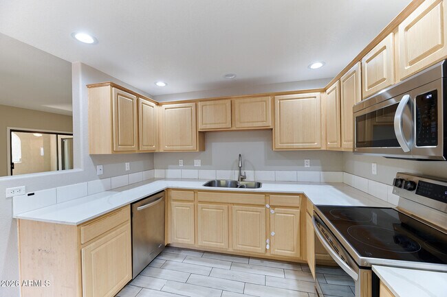 Building Photo - 9555 E Raintree Dr