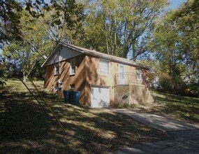 Building Photo - Two Bedroom House with Drive Under Garage!