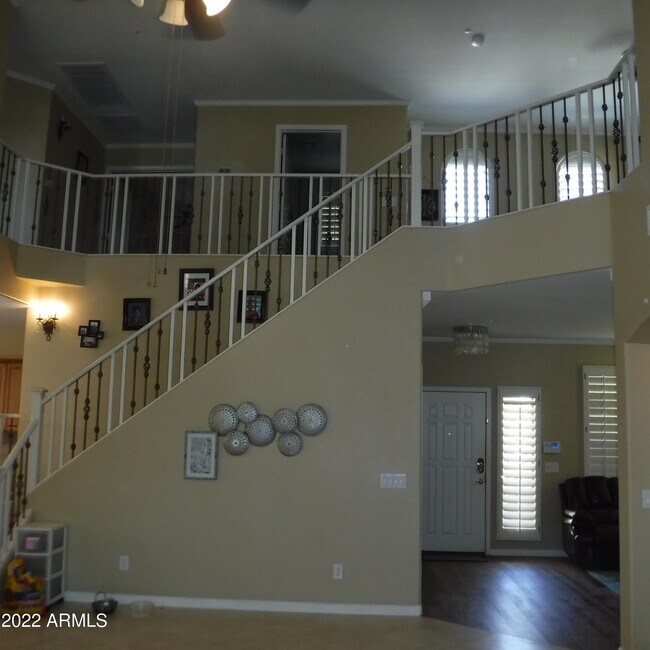 Building Photo - 9831 E Rosemary Ln