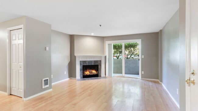 Building Photo - This ground floor corner-unit condo