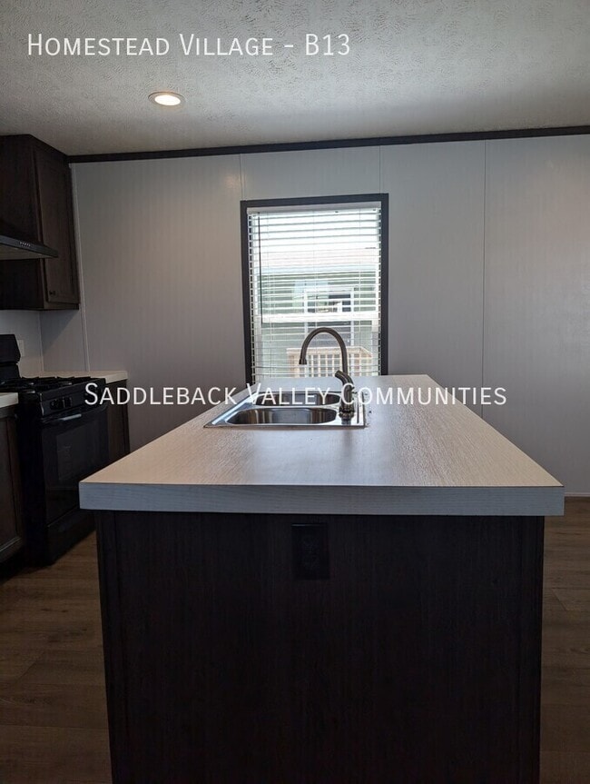 Building Photo - Homestead Village -B13