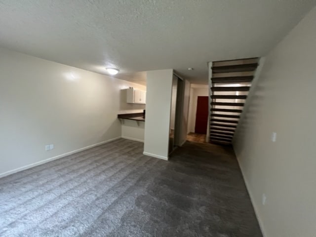 Living room and stairs - 777 Mill St