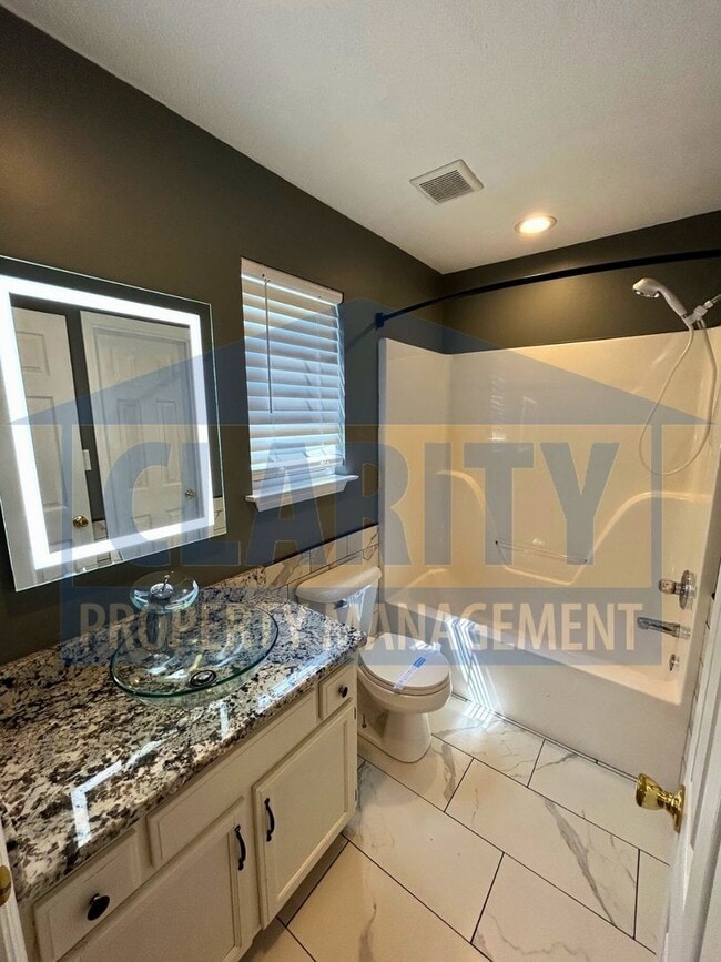 Building Photo - Three bedroom home in a quiet neighborhood!