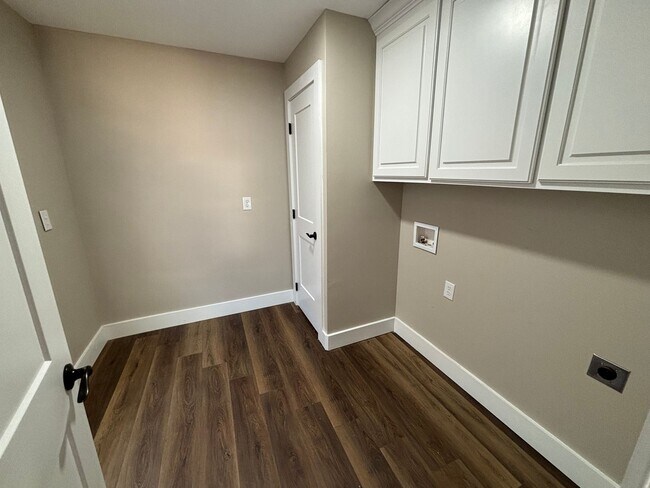 Building Photo - Welcome to this stunning new construction home located in the charming town of Atkins, AR.