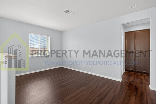 Building Photo - Spacious Elegance Awaits: 4-Bedroom Home with Hardwood Floors in Elk Grove!