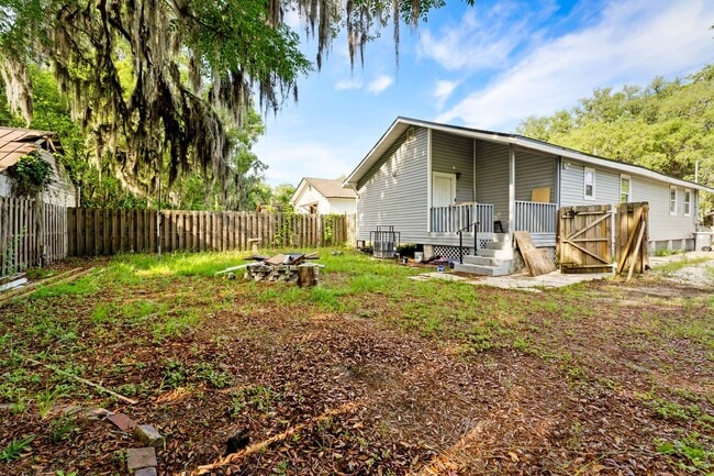 Building Photo - Home Sweet Home with Fire Pit & Modern Tou...