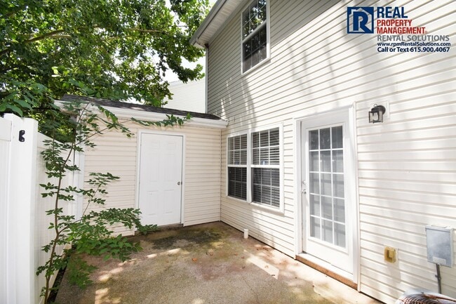 Building Photo - Adorable End Unit 2 bd Townhome with lawnc...