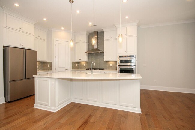Building Photo - Beautiful John Wieland end unit townhouse ...