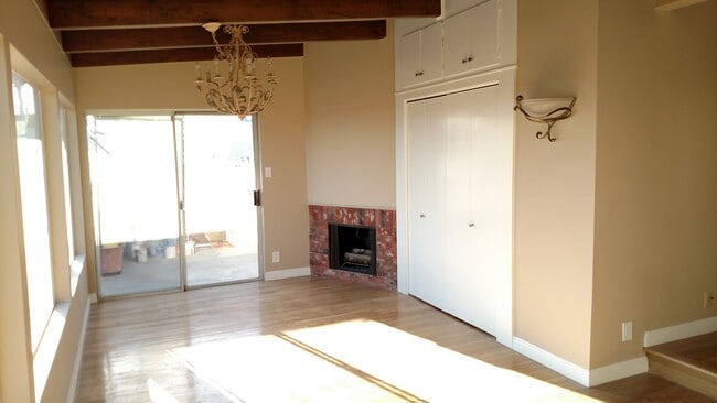 Step down den with fireplace - 5835 Tellefson Rd