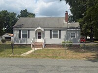 Building Photo - 2-bedroom 1 bathroom Cottage on a large lot with 2 large storage building on site