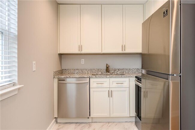 Building Photo - 880 St Charles Ave NE