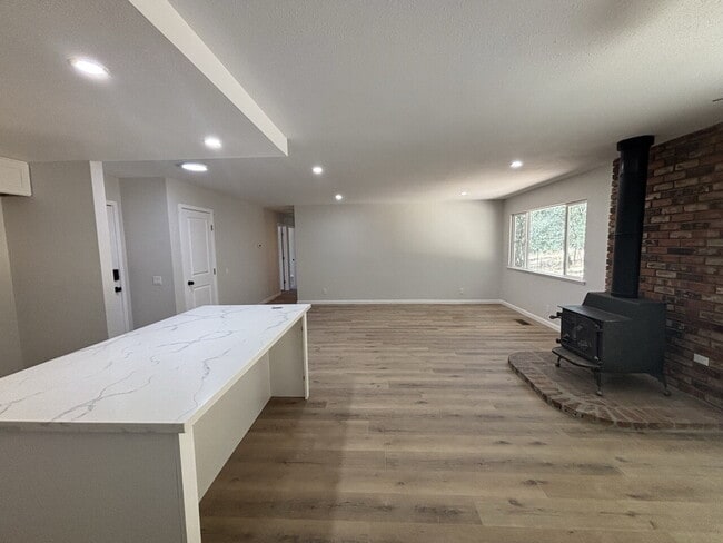 Building Photo - Fully remodeled home nestled on a spacious...
